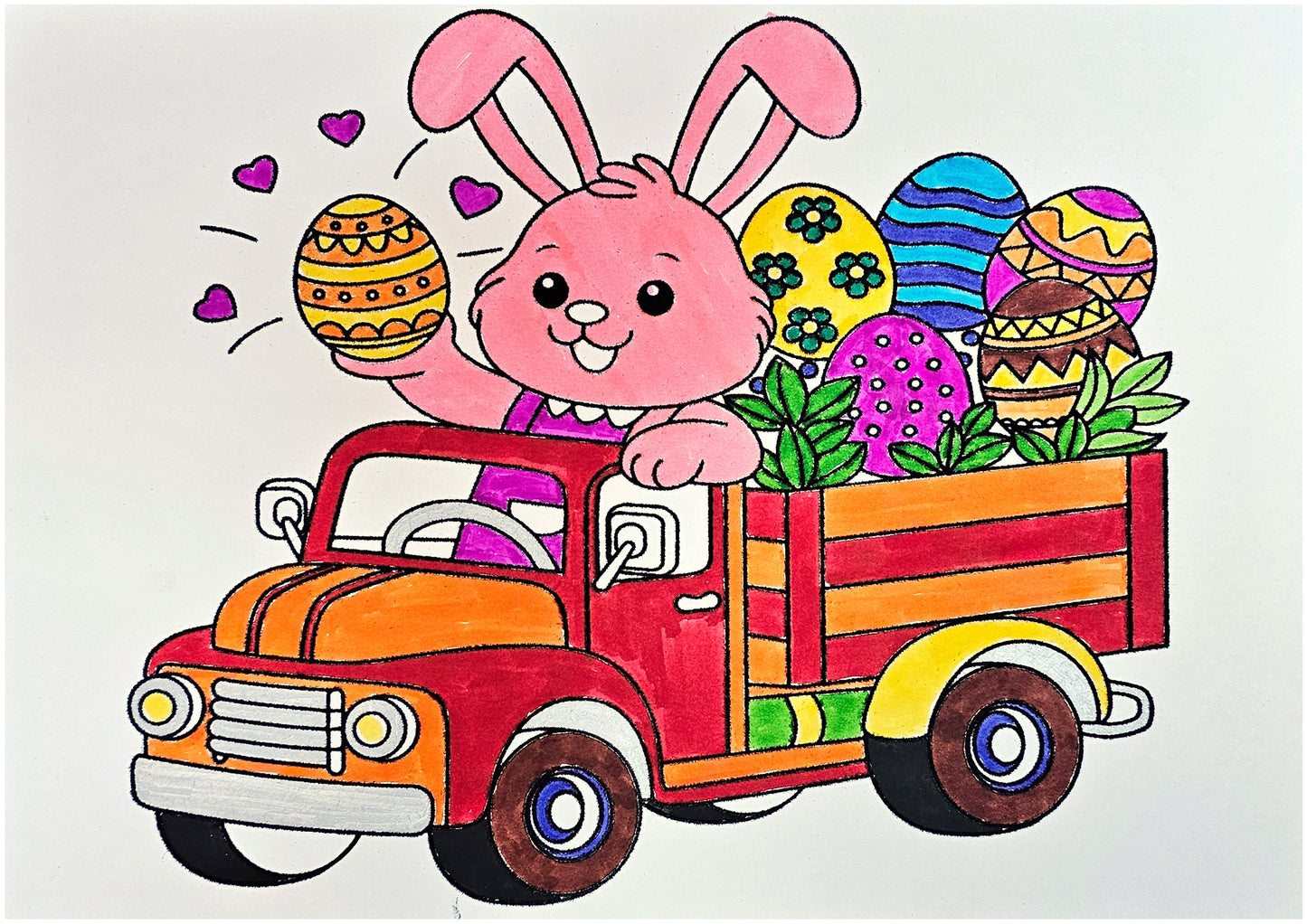 Features a cheerful bunny driving a vintage truck overflowing with Easter eggs.